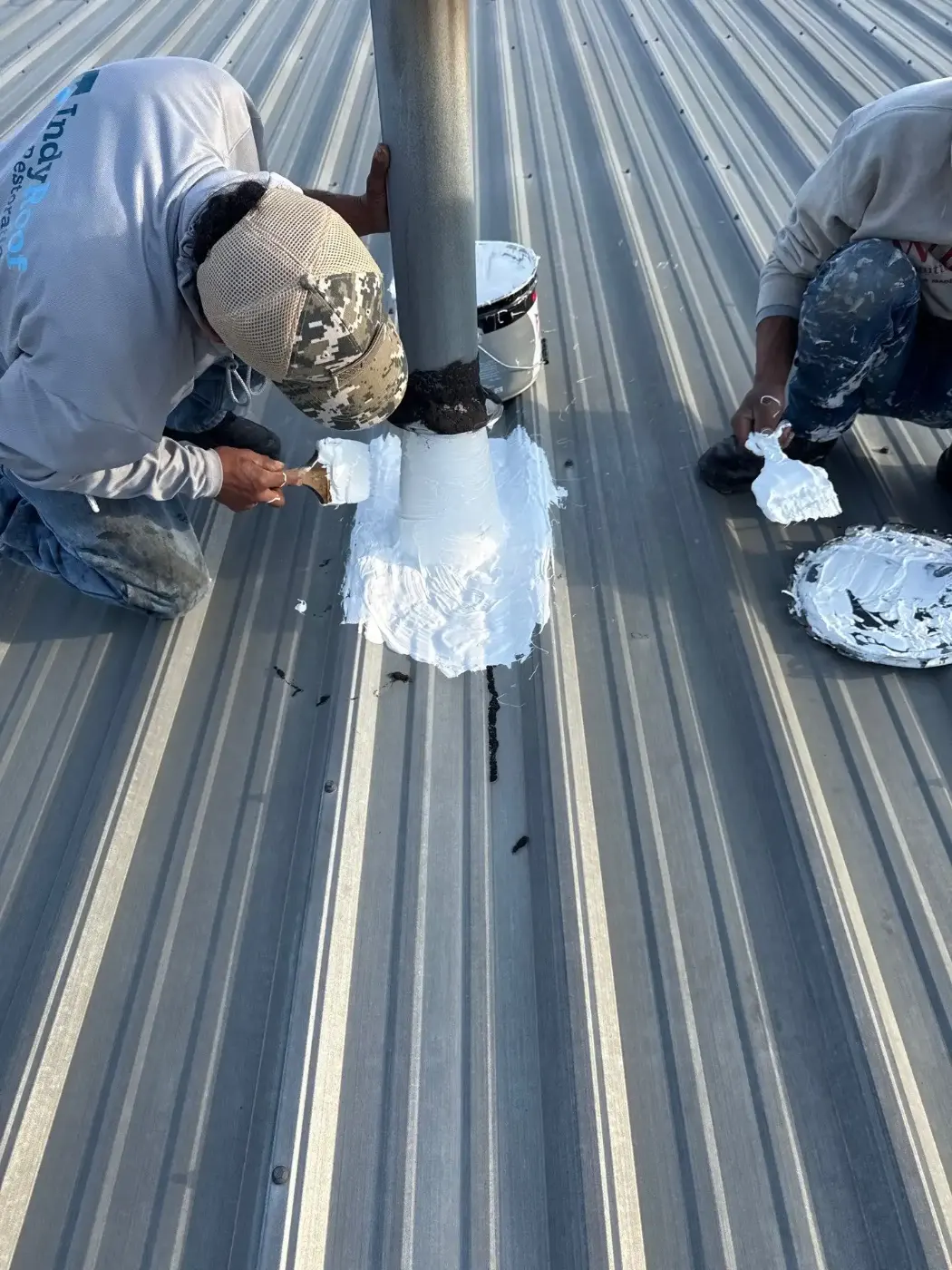 Tarping and dry-in on a Westport commercial roof